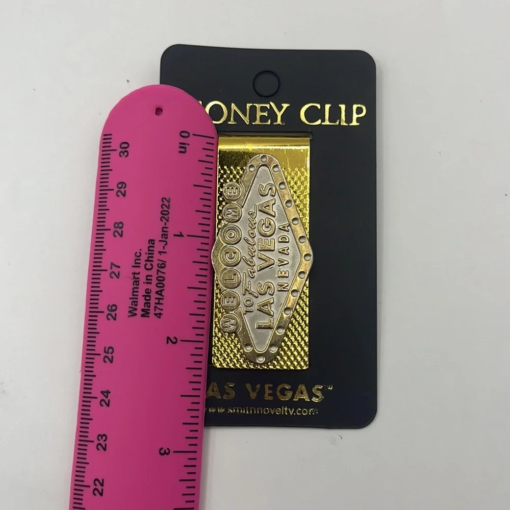 NWOT- Las Vegas Money gold toned Clip